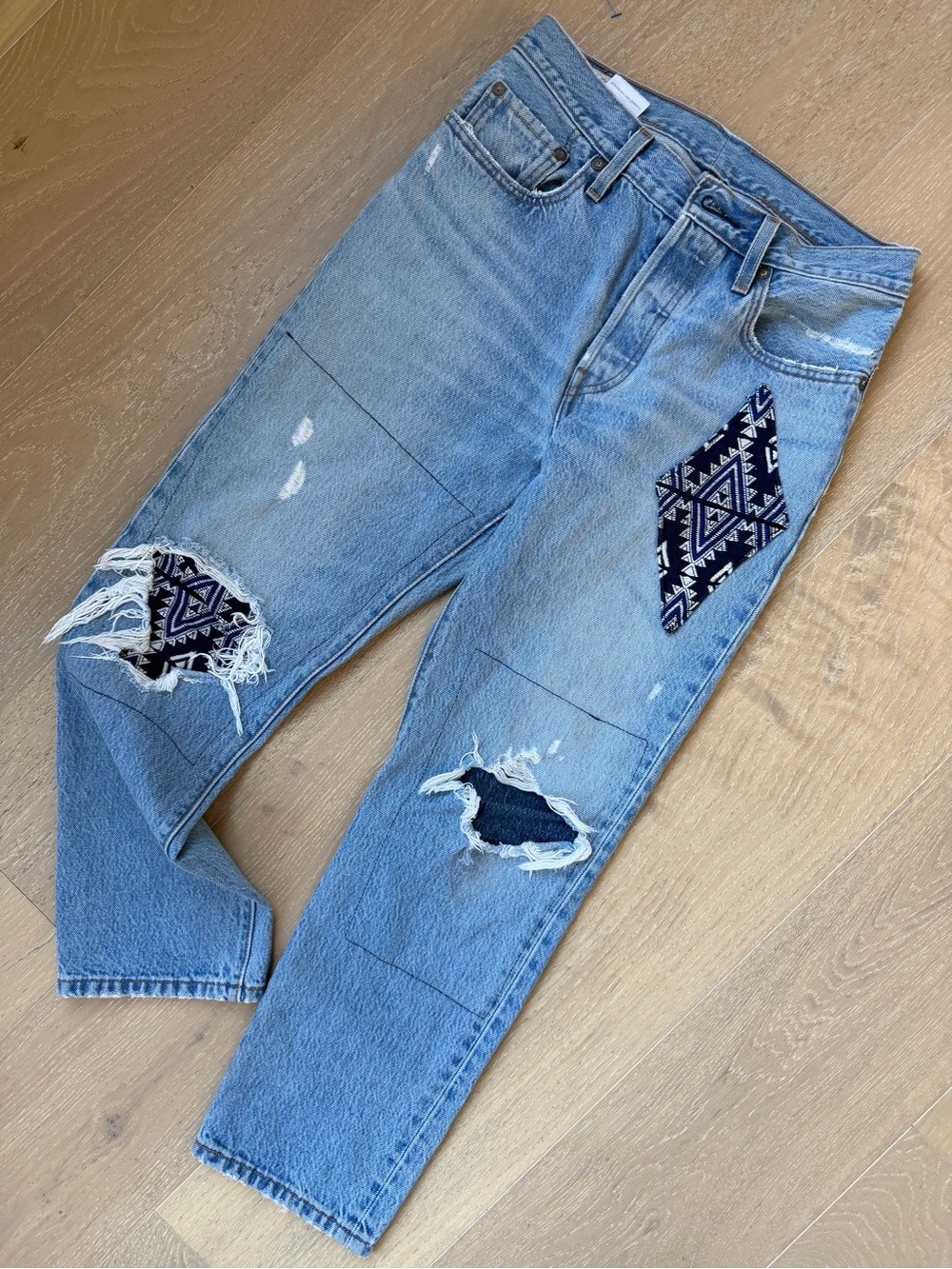 Vintage Levi’s BIG E Light Wash Distressed Jeans with Navy Aztec Patch